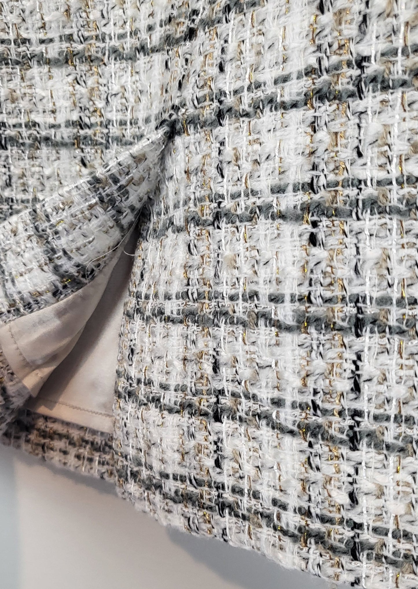 Detail of split of Beige Tweed Skirt With Gold Buttons | Size 14